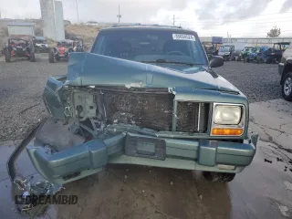 2000 Jeep Cherokee Limited with VIN 1J4FF68S0YL115669, listed as a Copart auction lot 85604524 with 0 mi miles and Salvage Title. Bid and sale history available at carsss.com. Image 5.