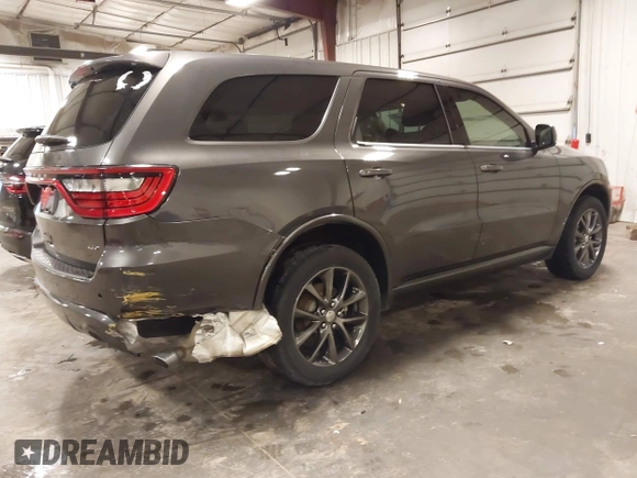2018 Dodge Durango GT with VIN 1C4RDJDGXJC174344, listed as a IAAI auction lot 41898449 with 111,311 mi miles and . Bid and sale history available at carsss.com. Image 4.