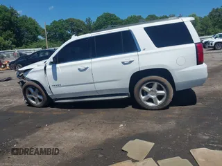 2015 Chevrolet Tahoe LT with VIN 1GNSCBKC4FR648715, listed as a IAAI auction lot 42267719 with Not provided miles and . Bid and sale history available at DreamBid. Image 14.
