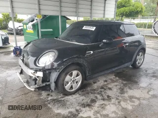 2015 MINI Hardtop z VIN WMWXM5C58F3A59800, wystawiony jako Copart lot #58853635 z przebiegiem 89 388 mil mil oraz Szkoda całkowita • Salvage title. Historia ofert i sprzedaży dostępna na DreamBid. Obrazek 1.