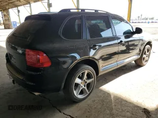 2006 Porsche Cayenne S with VIN WP1AB29P56LA66639, listed as a Copart auction lot 52097595 with 180,827 mi miles and Salvage title. Bid and sale history available at DreamBid. Image 3.
