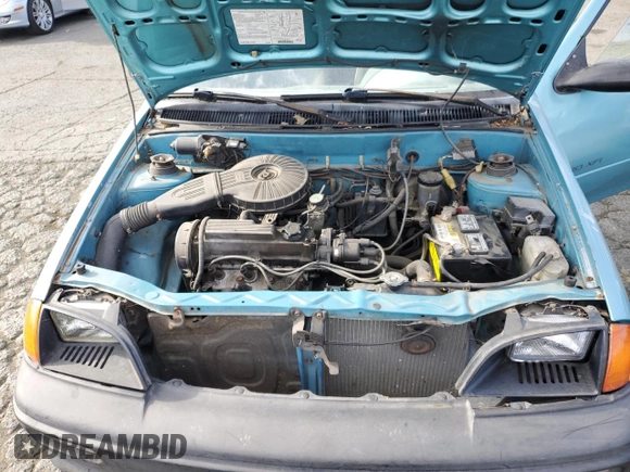 1992 Geo Metro z VIN 2C1MS2465N6782913, wystawiony jako Copart lot #77405574 z przebiegiem 77 080 mil mil oraz Szkody całkowita. Historia ofert i sprzedaży dostępna na DreamBid. Obrazek 11.