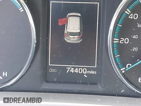 2016 Toyota RAV4 Hybrid XLE with VIN JTMRJREVXGD029019, listed as a IAAI auction lot 42021530 with 74,400 mi miles. Bid and sale history available at carsss.com. Image 16.