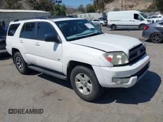 2003 Toyota 4Runner SR5 with VIN JTEZT14R830013883, listed as a IAAI auction lot 42004352 with 206,730 mi miles. Bid and sale history available at carsss.com. Image 1.