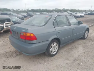 2000 Honda Civic EX with VIN 2HGEJ8648YH601225, listed as a IAAI auction lot 41945291 with 112,853 mi miles. Bid and sale history available at carsss.com. Image 4.