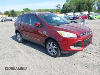 2016 Ford Escape Titanium with VIN 1FMCU9JX9GUA16892, listed as a IAAI auction lot 42110986 with 87,775 mi miles and . Bid and sale history available at DreamBid. Image 1.