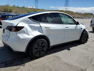 2024 Tesla Model Y Long Range with VIN 7SAYGAEE7RF205700, listed as a Copart auction lot 53814155 with 8,986 mi miles and Salvage Title. Bid and sale history available at DreamBid. Image 3.