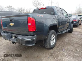 2019 Chevrolet Colorado 4WD Work Truck with VIN 1GCGTBEN8K1306088, listed as a IAAI auction lot 41807366 with 57,376 mi miles. Bid and sale history available at carsss.com. Image 4.