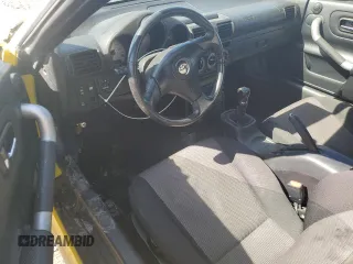 2002 Toyota MR2 z VIN JTDFR320520050071, wystawiony jako Copart lot #72550184 z przebiegiem 131 342 mil mil oraz Tytuł czysty. Historia ofert i sprzedaży dostępna na DreamBid. Obrazek 8.