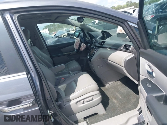2016 Honda Odyssey EX-L with VIN 5FNRL5H67GB081580, listed as a IAAI auction lot 41935281 with 201,000 mi miles and . Bid and sale history available at DreamBid. Image 5.