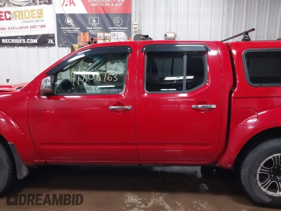 2006 Nissan Frontier SE z VIN 1N6AD07W86C401156, wystawiony jako IAAI lot #41808763 z przebiegiem 200 825 mil mil oraz . Historia ofert i sprzedaży dostępna na DreamBid. Obrazek 14.