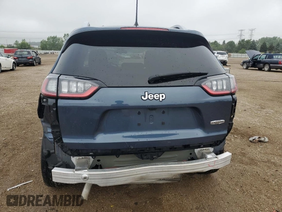 2019 Jeep Cherokee Latitude with VIN 1C4PJLCB9KD412004, listed as a Copart auction lot 61642015 with 121,336 mi miles and Salvage title. Bid and sale history available at DreamBid. Image 6.
