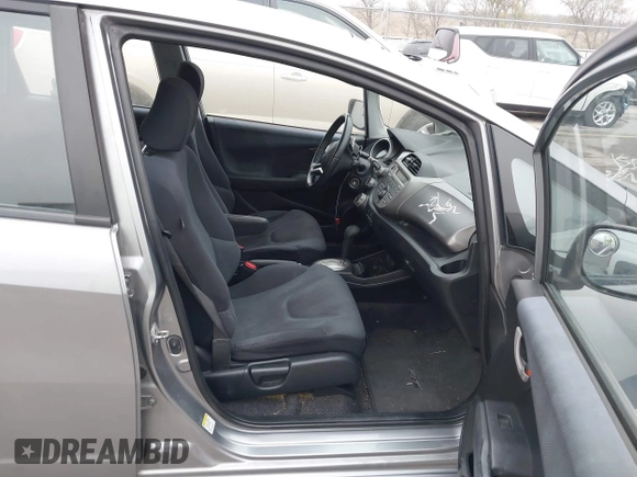 2009 Honda Fit Sport with VIN JHMGE88469S063030, listed as a IAAI auction lot 42064670 with 156,791 mi miles. Bid and sale history available at carsss.com. Image 5.