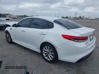 2018 Kia Optima LX with VIN 5XXGT4L34JG253597, listed as a IAAI auction lot 41915762 with 166,521 mi miles. Bid and sale history available at carsss.com. Image 3.