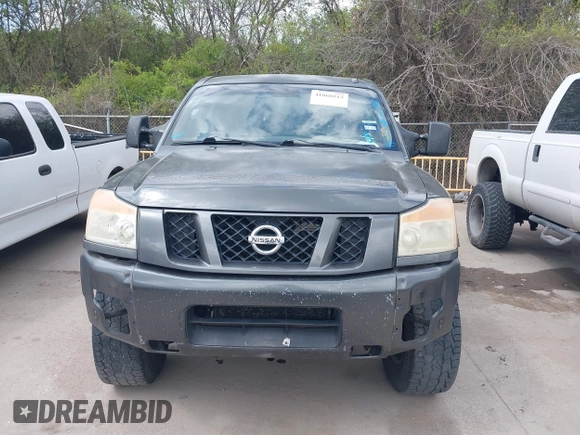 2011 Nissan Titan Pro-4X with VIN 1N6BA0EC3BN320795, listed as a IAAI auction lot 41868113 with 183,919 mi miles and . Bid and sale history available at DreamBid. Image 12.