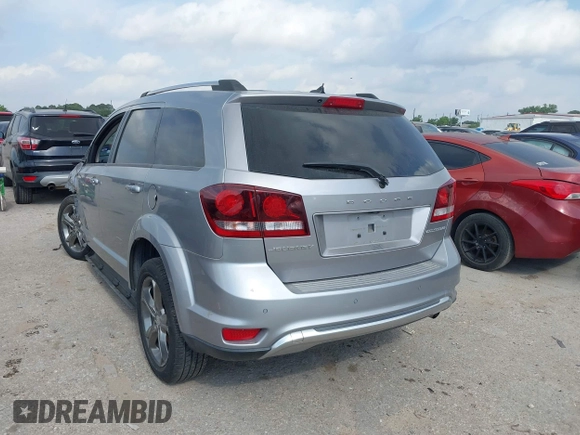 2016 Dodge Journey Crossroad Plus z VIN 3C4PDCGB0GT131602, wystawiony jako IAAI lot #42043545 z przebiegiem 102 225 mil mil oraz . Historia ofert i sprzedaży dostępna na DreamBid. Obrazek 3.