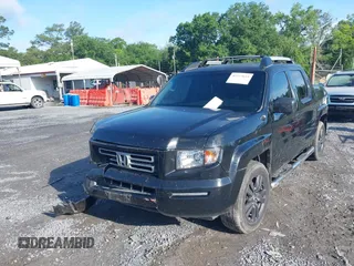2007 Honda Ridgeline RT with VIN 2HJYK162X7H539271, listed as a IAAI auction lot 42223619 with 237,940 mi miles and . Bid and sale history available at DreamBid. Image 2.