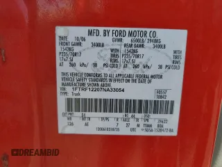 2007 Ford F-150 XL with VIN 1FTRF12207NA33054, listed as a Copart auction lot 65013245 with 100,792 mi miles and Clean title. Bid and sale history available at DreamBid. Image 12.