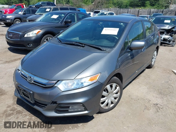 2013 Honda Insight with VIN JHMZE2H31DS002352, listed as a IAAI auction lot 42551515 with 148,393 mi miles and . Bid and sale history available at DreamBid. Image 2.