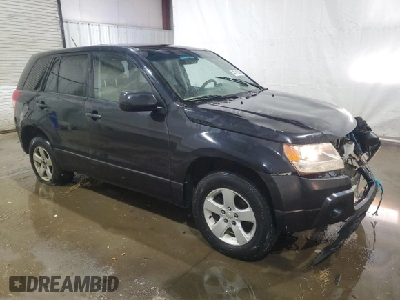 2011 Suzuki Grand Vitara Premium with VIN JS3TD0D28B4102673, listed as a Copart auction lot 43216005 with 141,726 mi miles and Salvage title. Bid and sale history available at DreamBid. Image 4.