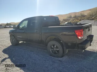 2014 Nissan Titan S with VIN 1N6AA0EC1EN510658, listed as a Copart auction lot 75210054 with Not Provided miles and Salvage Title. Bid and sale history available at DreamBid. Image 2.