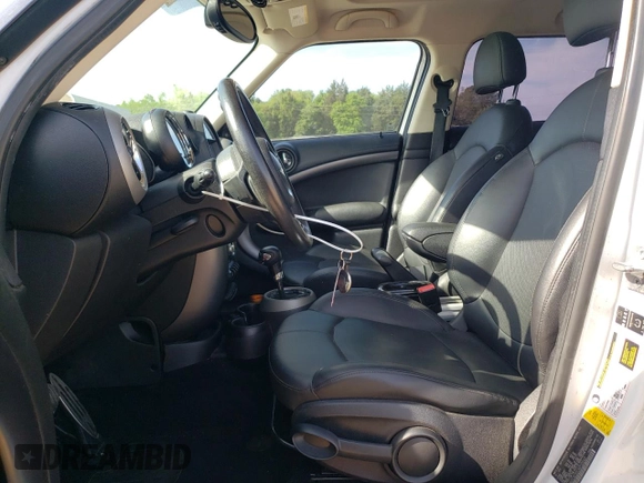 2012 MINI Countryman S with VIN WMWZC3C55CWP20240, listed as a Copart auction lot 53879585 with 141,331 mi miles and Salvage Title. Bid and sale history available at DreamBid. Image 7.