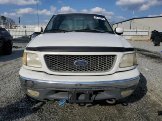 2000 Ford F-150 XL with VIN 1FTRX18L1YNB97492, listed as a Copart auction lot 48732055 with 315,898 mi miles and Salvage Title. Bid and sale history available at carsss.com. Image 5.