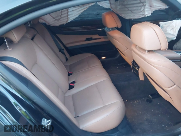 2015 BMW 7 Series 740Li xDrive with VIN WBAYF4C51FGS99074, listed as a IAAI auction lot 41222498 with 132,789 mi miles. Bid and sale history available at carsss.com. Image 8.