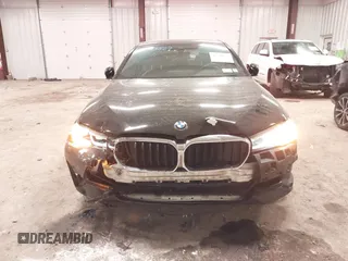 2021 BMW 5 Series 530i xDrive with VIN WBA13BJ09MCF64918, listed as a IAAI auction lot 41749529 with 90,076 mi miles and . Bid and sale history available at carsss.com. Image 12.