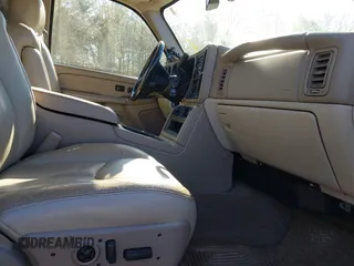 2004 Chevrolet Suburban LS with VIN 1GNEC16Z14J112645, listed as a IAAI auction lot 41699031 with 105,707 mi miles. Bid and sale history available at carsss.com. Image 5.