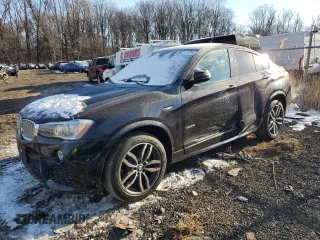 2015 BMW X4 xDrive35i with VIN 5UXXW5C55F0E88521, listed as a Copart auction lot 88212125 with 63,127 mi miles and Salvage Title. Bid and sale history available at carsss.com. Image 1.