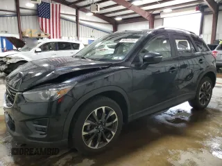 2016 Mazda CX-5 Grand Touring with VIN JM3KE4DY2G0738899, listed as a Copart auction lot 50943255 with 80,807 mi miles and Salvage Title. Bid and sale history available at carsss.com. Image 1.