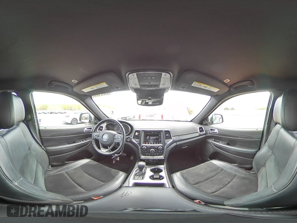 2018 Jeep Grand Cherokee Laredo E with VIN 1C4RJFAG0JC173200, listed as a Copart auction lot 55326805 with 127,489 mi miles and Salvage Title. Bid and sale history available at DreamBid. Image 15.