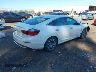 2020 Honda Insight Touring with VIN 19XZE4F98LE004931, listed as a IAAI auction lot 40832066 with 79,013 mi miles and . Bid and sale history available at carsss.com. Image 4.