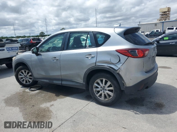2014 Mazda CX-5 Sport with VIN JM3KE2BE1E0402185, listed as a Copart auction lot 52313675 with 140,398 mi miles and Salvage Title. Bid and sale history available at carsss.com. Image 2.
