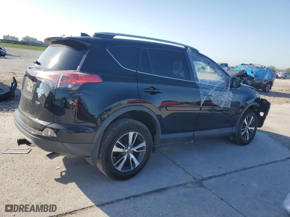 2018 Toyota RAV4 XLE with VIN 2T3WFREV2JW472232, listed as a Copart auction lot 52464025 with 131,421 mi miles and Salvage Title. Bid and sale history available at carsss.com. Image 3.
