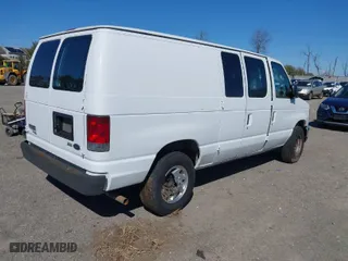2013 Ford Econoline Cargo Van Commercial with VIN 1FTNE2EWXDDA24465, listed as a IAAI auction lot 41747959 with 228,246 mi miles. Bid and sale history available at carsss.com. Image 4.