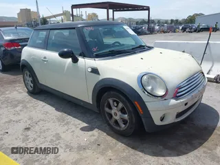 2009 MINI Cooper Hardtop with VIN WMWMF33569TU75508, listed as a IAAI auction lot 42090523 with 247,856 mi miles. Bid and sale history available at carsss.com. Image 1.