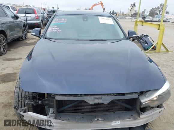 2014 BMW 3 Series 328i with VIN WBA3C1C56EK108665, listed as a IAAI auction lot 42101319 with 84,928 mi miles and . Bid and sale history available at DreamBid. Image 13.