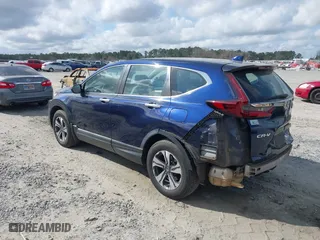 2020 Honda CR-V LX with VIN 5J6RW1H26LL004200, listed as a IAAI auction lot 41560668 with 85,628 mi miles. Bid and sale history available at carsss.com. Image 3.