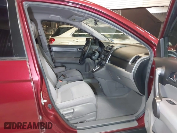 2009 Honda CR-V LX with VIN JHLRE48339C018957, listed as a IAAI auction lot 41952951 with 76,502 mi miles. Bid and sale history available at carsss.com. Image 5.