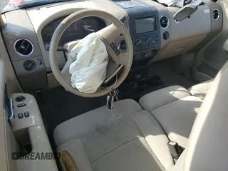 2005 Ford F-150 STX with VIN 1FTRF04W05KC08119, listed as a Copart auction lot 69045024 with 103,924 mi miles and Salvage title. Bid and sale history available at DreamBid. Image 8.