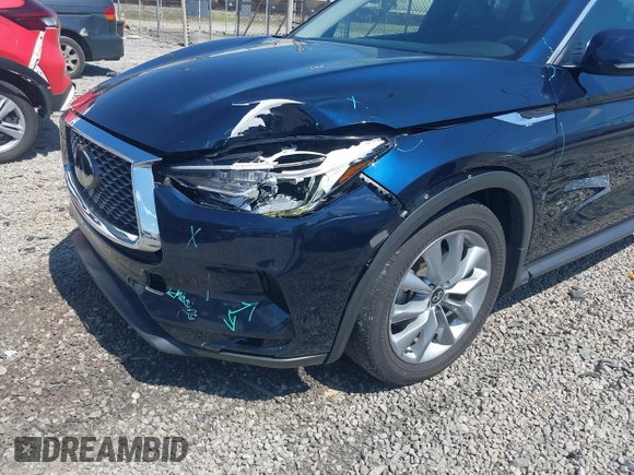 2022 Infiniti QX50 Luxe z VIN 3PCAJ5BA9NF108288, wystawiony jako IAAI lot #42646497 z przebiegiem 65 145 mil mil oraz . Historia ofert i sprzedaży dostępna na DreamBid. Obrazek 19.