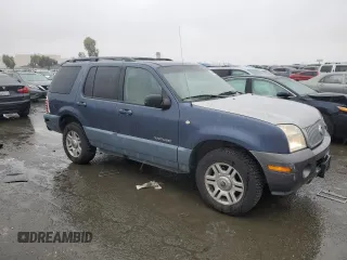 2002 Mercury Mountaineer z VIN 4M2DU66E12ZJ34780, wystawiony jako Copart lot #42529655 z przebiegiem 142 723 mil mil oraz Szkoda całkowita • Salvage title. Historia ofert i sprzedaży dostępna na DreamBid. Obrazek 4.