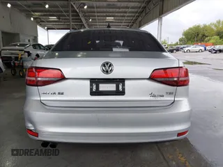 2016 Volkswagen Jetta Sedan 1.4T SE with VIN 3VWD67AJ2GM252658, listed as a IAAI auction lot 41757319 with 147,483 mi miles. Bid and sale history available at carsss.com. Image 16.