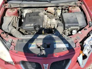 2006 Pontiac G6 6-Cyl z VIN 1G2ZG558364131914, wystawiony jako Copart lot #58775044 z przebiegiem 178 484 mil mil oraz Szkoda całkowita • Salvage title. Historia ofert i sprzedaży dostępna na DreamBid. Obrazek 12.