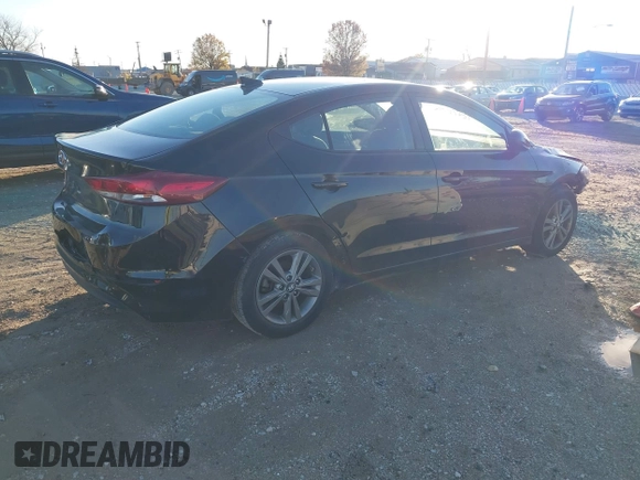 2018 Hyundai Elantra SEL with VIN 5NPD84LF8JH390464, listed as a IAAI auction lot 40891063 with 126,460 mi miles. Bid and sale history available at carsss.com. Image 4.