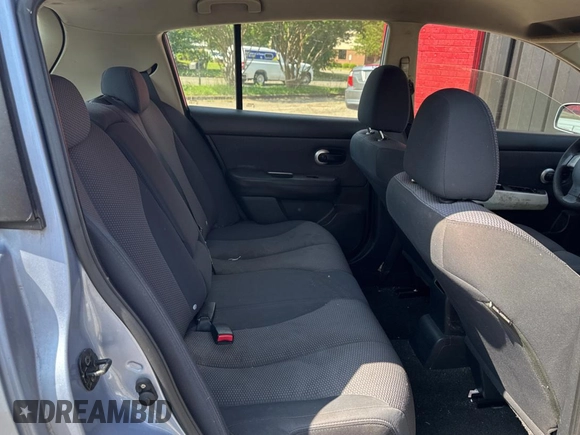 2009 Nissan Versa S with VIN 3N1BC13E99L412868, listed as a Copart auction lot 55990665 with 214,080 mi miles and Clean Title. Bid and sale history available at DreamBid. Image 6.