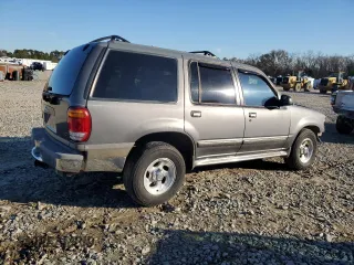 1999 Ford Explorer XL with VIN 1FMZU34X8XUC31019, listed as a Copart auction lot 87831635 with 220,683 mi miles and Salvage title. Bid and sale history available at DreamBid. Image 3.