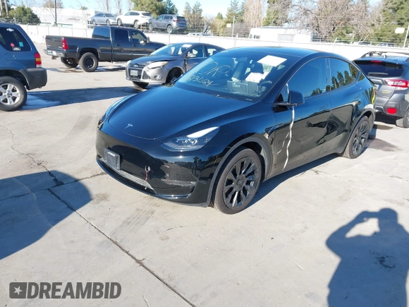 2024 Tesla Model Y Long Range with VIN 7SAYGDEEXRF983040, listed as a IAAI auction lot 41555332 with 79,506 mi miles and . Bid and sale history available at DreamBid. Image 19.